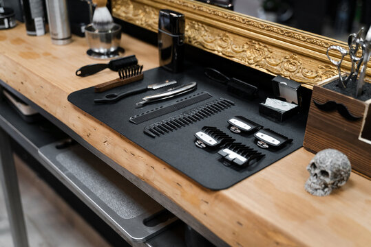 Barber's Tools On Wooden Background