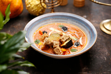 Cream soup made of baked vegetables.
Culinary photography. Suggestion to serve the dish.
