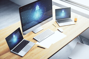 Modern computer monitor with creative light bulb hologram and chip on laptop background, idea and brainstorming concept. 3D Rendering