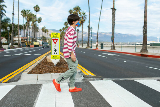 Boy by zebra crossing in santa barbara