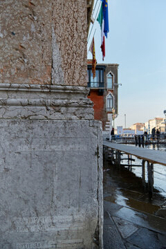 Stone carvings marking previous flood records in Venice