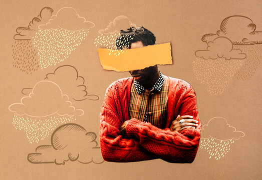 Man in red cardigan with clouds