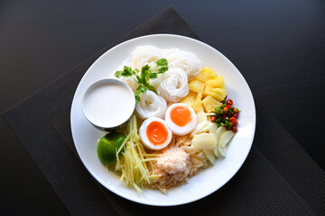 Thai Rice Noodle with Pineapple and Coconut Milk, Thai traditional Khanom Jeen Sao Nam, fine dining.