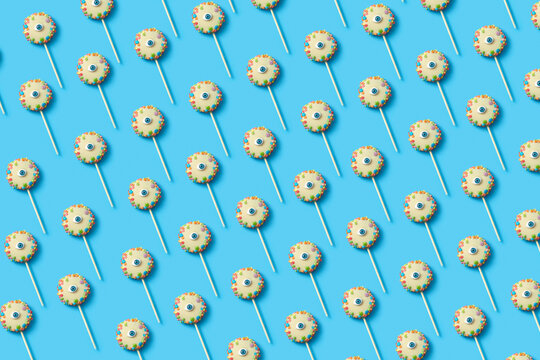 Seamless pattern of eye lollipops