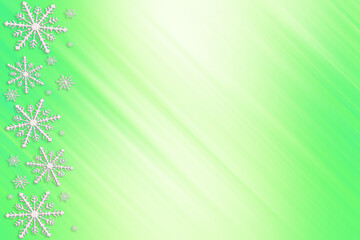 Fototapeta na wymiar Winter yellow green mint saturated bright gradient background with random snowflakes sideways and with diagonal light stripes. Christmas, New Year card with copy space.