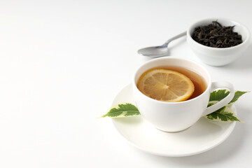 Concept of hot drink with tea on white background