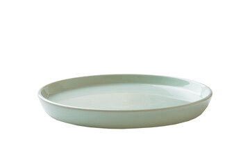 Blue ceramic round plate isolated over white background. perspective view