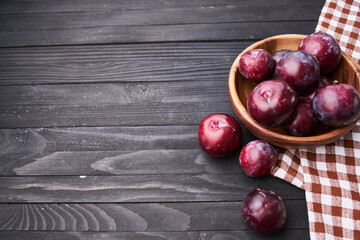 plums fruits natural products on a wooden table top view