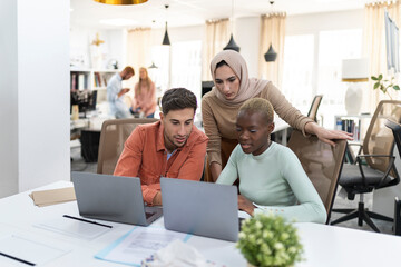 Coworkers having a business meeting in the office.