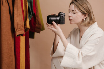 Woman taking picture of stylish apparel