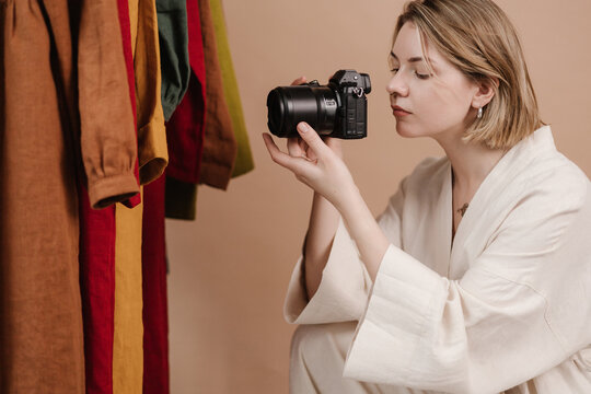 Woman taking picture of stylish apparel
