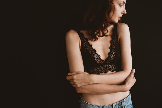 Atractive woman against black background
