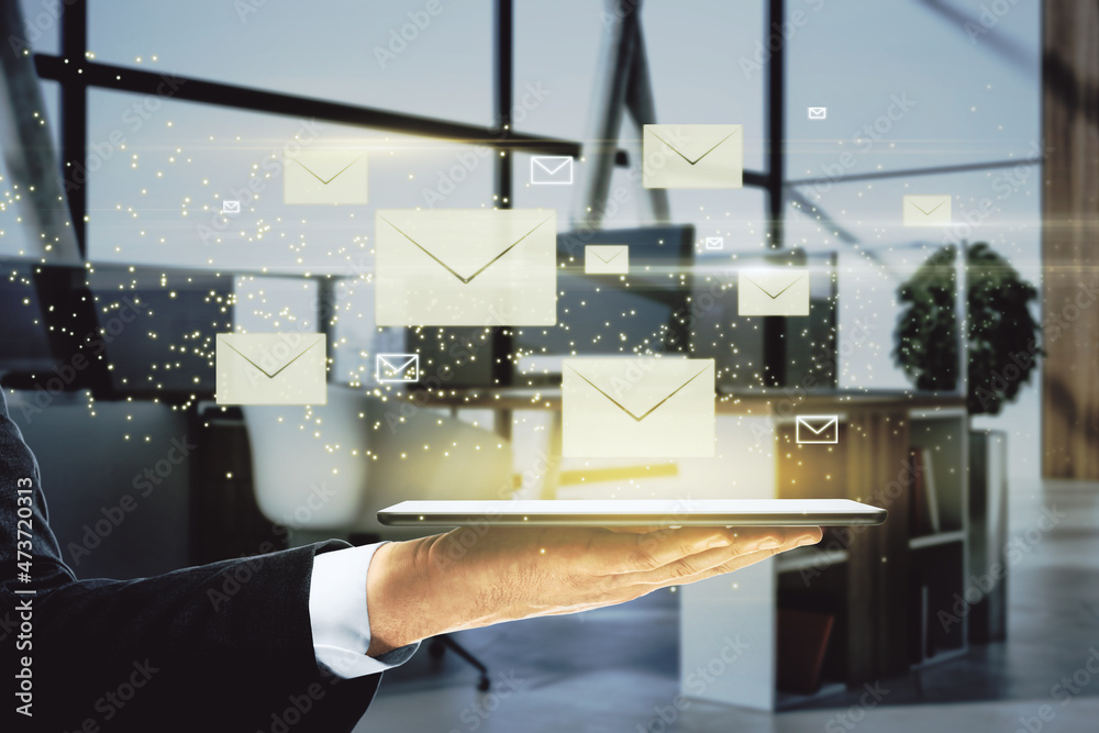Aufkleber close up of businessman hand holding tablet with creative glowing letters interface on blurry office
