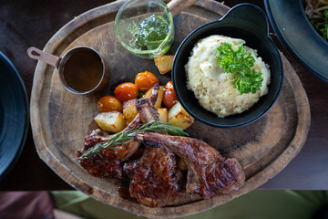 Grilled lamb carre with warm couscous salad, roasted vegetables