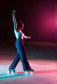 Roller skater woman at night