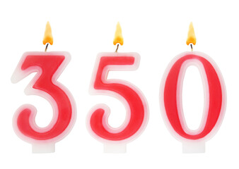 Burning red birthday candles isolated on white background, number 350.