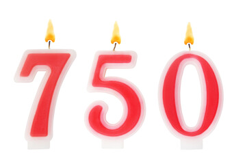 Burning red birthday candles isolated on white background, number 750.