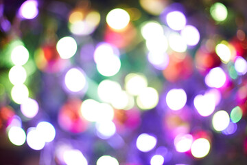 Background with blurring of Christmas de focused lights