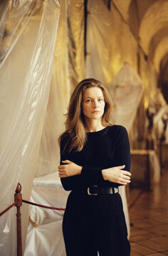 Young woman standing in museum