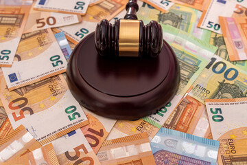 Judge gavel on euro banknotes