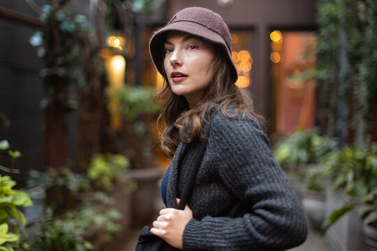 Woman looking over her shoulder