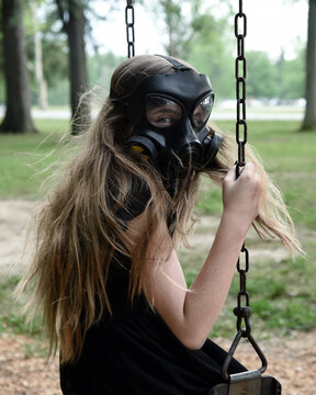 Girl Wearing Gas Mask Outside
