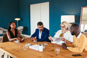 Lawyers and clients negotiating contract