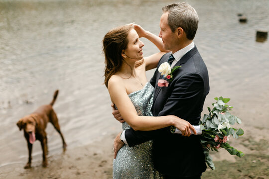 Eloping Couple with Dog at River