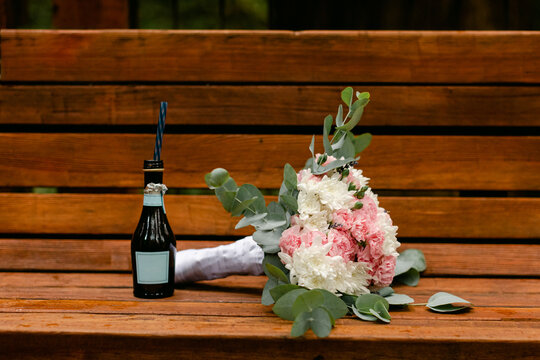 Flower Bouquet And Mini Champagne Bottle