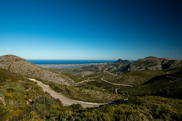 Winding mountain road between Pego village and Vall d'Ebo, Marina Alta, Costa Blanca, Alicante Province, Spain