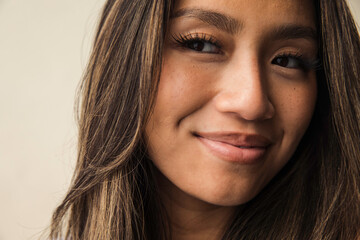 Closeup of a beautiful asian model smiling