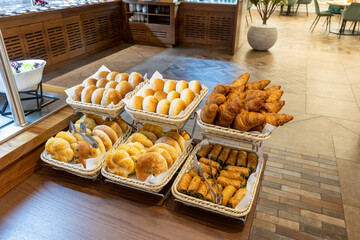 Various types of buns served on a buffet table