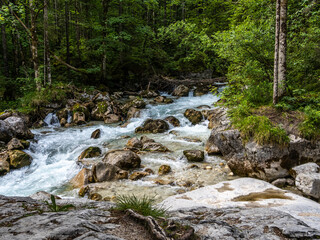 Magic Forest Zauberwald at Lake Hintersee with Creek Ramsauer Ache. National Park Berchtesgadener Land, Germany