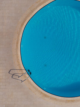 round swimming pool top view with copyspace