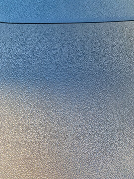 condensed waterdrops on car bonnet