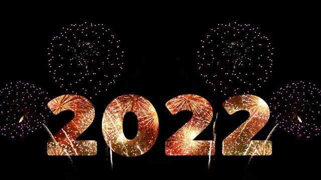 4K. loop seamless of firework of year 2022 greeting during new year eve countdown celebration, real golden fireworks festival in the sky display at night