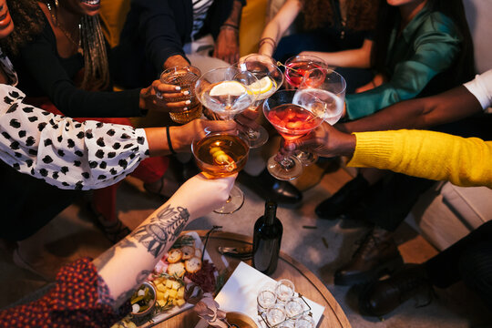 Diverse friends proposing toast