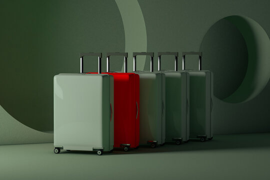 Suitcases in line on a stage on green color background