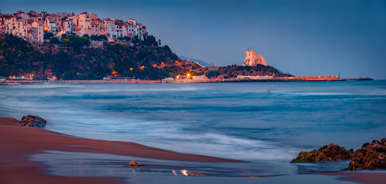 Spectacular summer cityscape of Sperlonga town with Truglia Tower. Majestic morning seascape of Mediterranean coast of Italy, Europe. Vacation concept background.