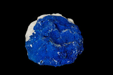 Macro mineral stone Azurite in siltstone against black background
