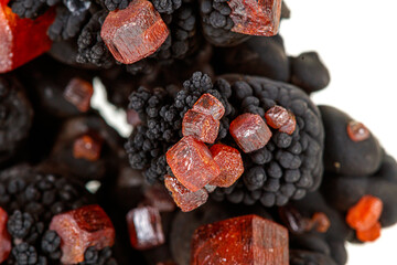 Macro mineral stone Vanadinite on a white background