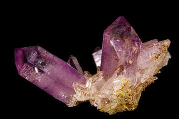 Macro of amethyst mineral stone on black background