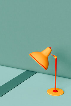 Yellow vintage lamp on blue background