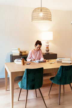 Hispanic professor checking report