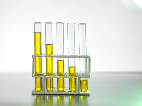 Oil In Test Tubes On Table