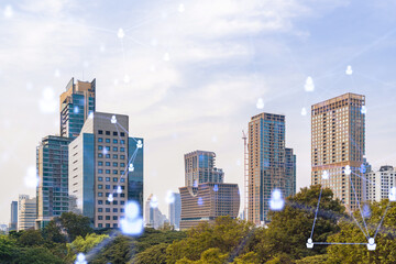 Fototapeta premium Social media icons hologram over panorama city view of Bangkok, Southeast Asia. The concept of people networking, connections and career opportunities. Double exposure.