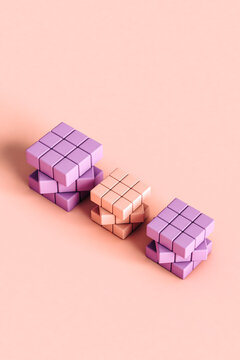 Studio shot of pastel colored blank puzzle cubes