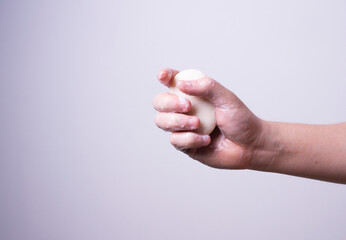 the man washes his hands with soap