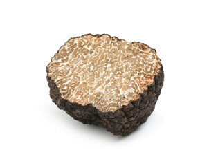 Cut fresh black truffle isolated on white