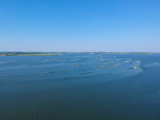 Fish raising cage in the large reservoir of Lampao Dam,local farmer in Kalasin ,Thailand.